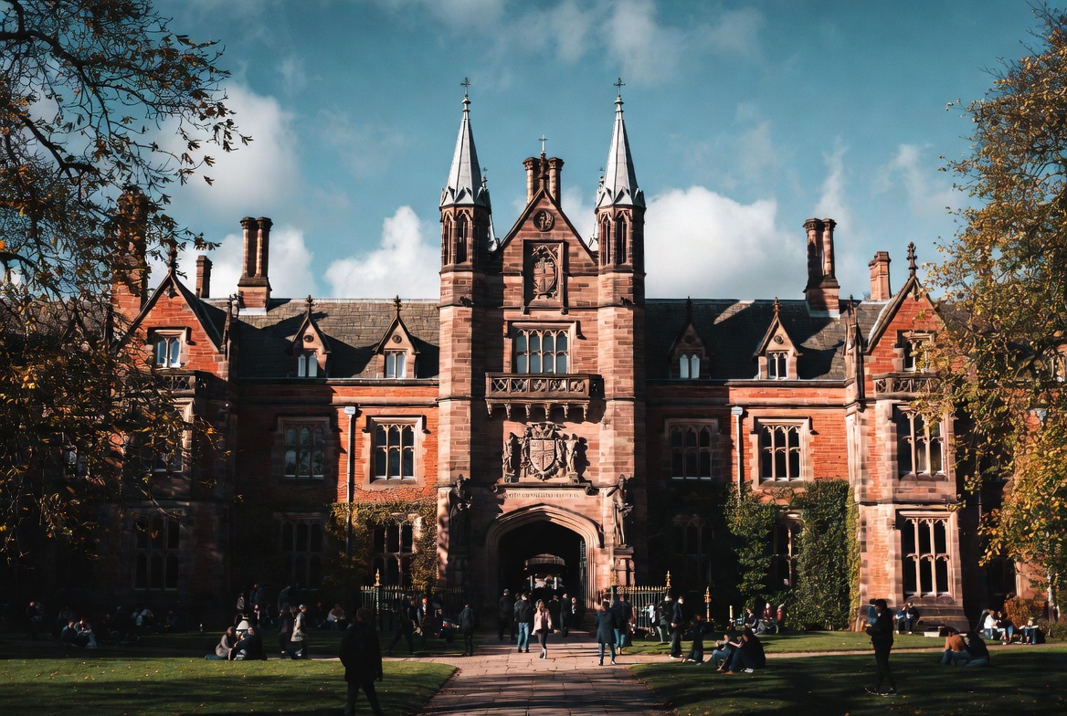 Students on the lawn at University of Brigant